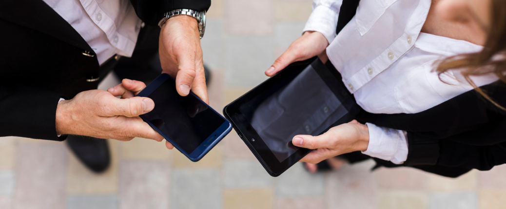 top-view-man-woman-with-devices 2
